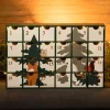 Adventskalenderhus i trä