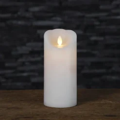 Blockljus med glimmande låga