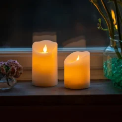 Blockljus med glimmande låga