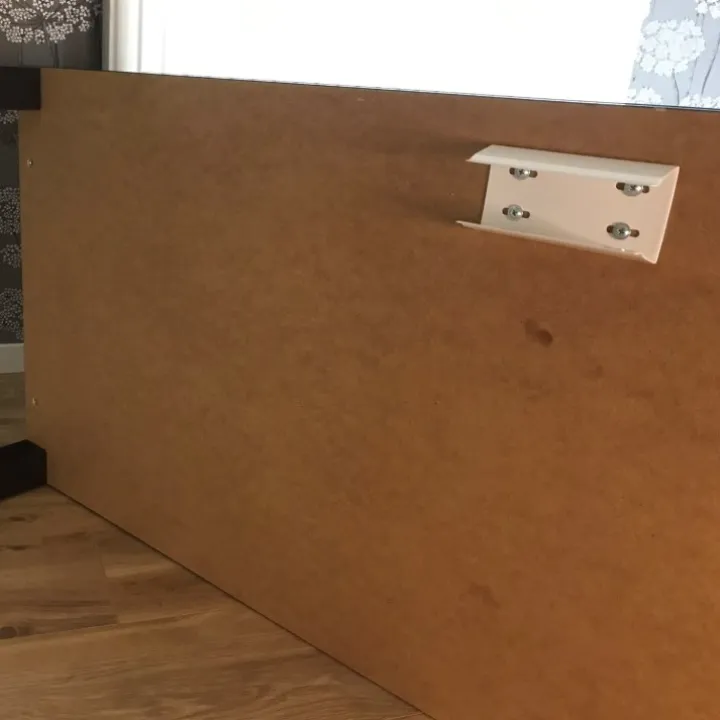 Grenuttagshållare