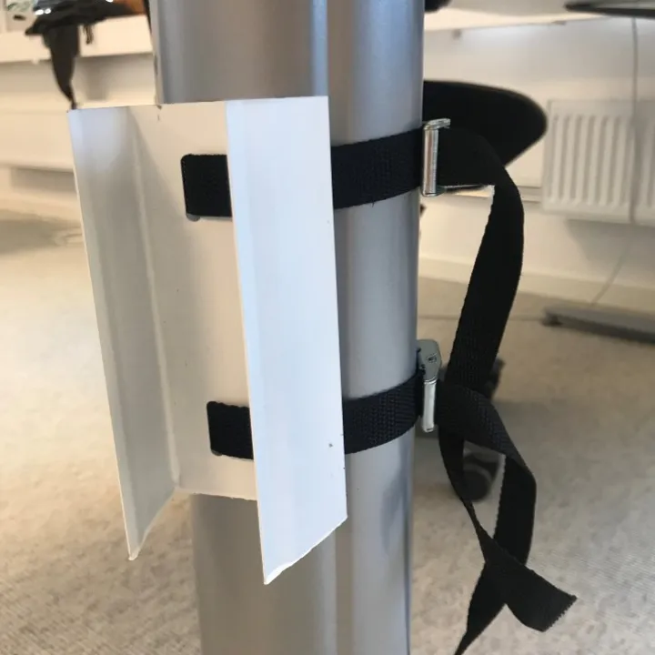 Grenuttagshållare