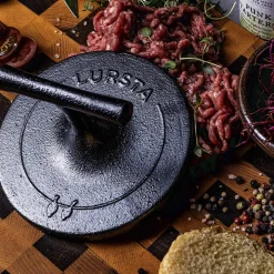 Hamburgerpress i gjutjärn, Lursta