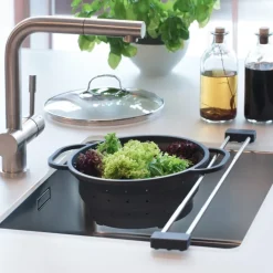 Justerbar avdelare till diskhon