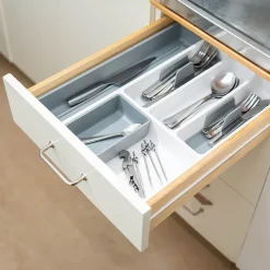 Justerbar insatslåda