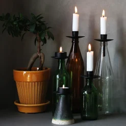 Ljushållare till flaskan