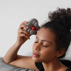 Massageapparat för hårbotten, Breo