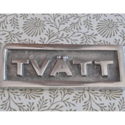 Metallskylt, Tvätt
