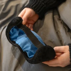 Sovmask med trådlösa hörlurar