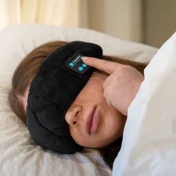 Sovmask med trådlösa hörlurar
